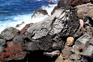Everything on this island is volcanic in origin.  Walking along the north-facing shoreline was characterised by rough seas and a huge variety of bits of lava bubble and other volcanic boulders.  