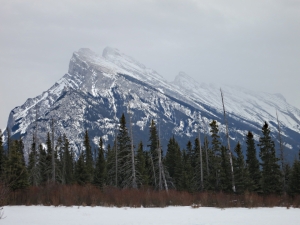 Mount Rundle across a snow-covered Vermillion Lake