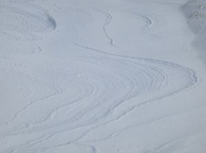Snow is blown into weird patterns