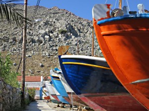 Boats dragged up on the foreshore at Pedi