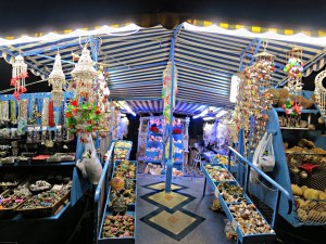 One of the boats moored in the harbour selling nothing but shells and associated sea-life