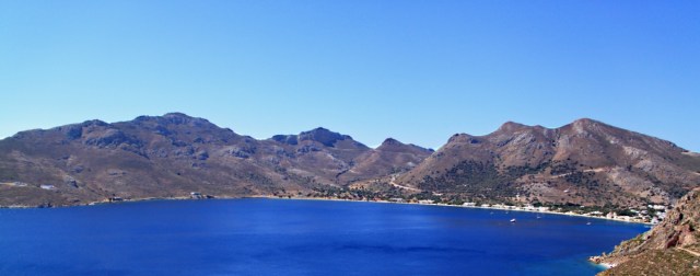 The curve of mountains bordering Livadia Bay to south and east