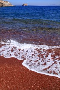 The beach really is that red, the sea that clear and that blue 