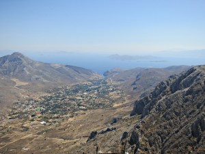 Looking down the flank of the ,mountain towards the distant fjord-like bay