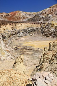 Rock pinnacles on the edge of the crater show how crumbly the rock is