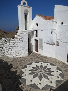 The Hochlakos patterned courtyard and the spiral stone steps to the bell tower
