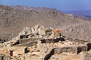 Part of the now abandoned village clustered close to a prominent crag