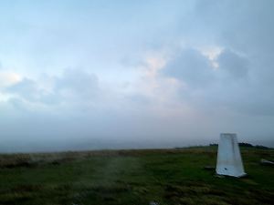 Crouching to the ground in driving rain, a poor attempt to photograph the narrow blue gap on the lee side of the mountain