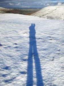 Tall photographer on the summit, extra tall because only 5 days after the Winter Solstice