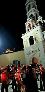 After the Saturday midnight service going home with lighted candles.