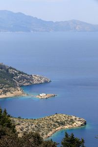 Looking over the island monastery of Agios Emilianos to the Turkish coast beyond