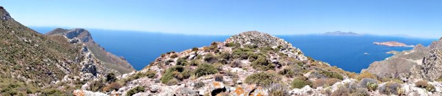 Wide panoramic view from the slabs in the col. Nisyros in the background