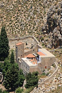 Looking back as the path climbs above the monastery