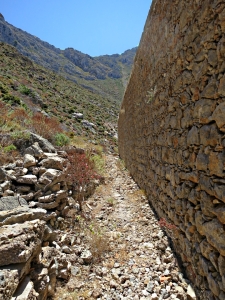 The path first follows the high wall at the top of the monastery compound