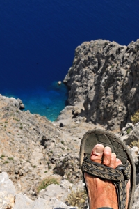 Photographer on the edge:  500 metres straight down to cool blue sea