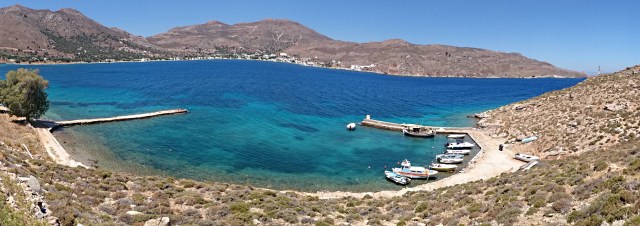 Looking across the Agios Stephanos harbour with its complement of small fishing boats