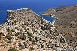 Behind the castle and way below is the tiny harbour of Agios Stephanos