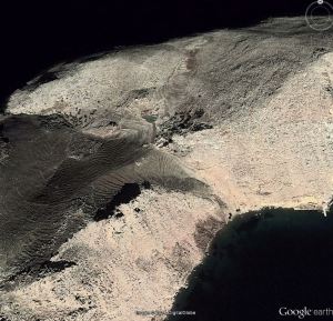 Zooming in on the crag and the col