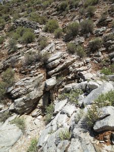 Crossing one of the gulleys which drops away steeply to the left
