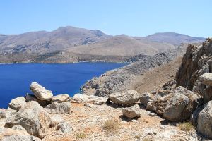 Looking from the platform across Nimborio Bay and the entrance to Yialos harbour to the ridge above Pedi