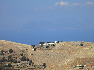 Looking across the the ridge-top monastery of Panagia Mirtiotissa far below