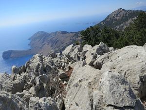 At the top of the razor limestone crag