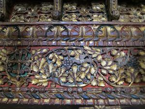 Detail showing the vine-leaves and grapes