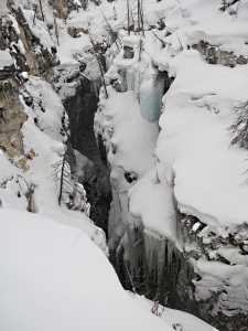 Canyon walls now about 60 feet high, thick with huge icicles