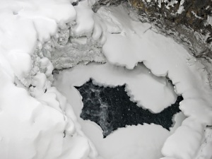 Looking down from one of the bridges to the partly frozen creek far below