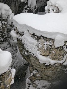 Another rock spur capped by snow