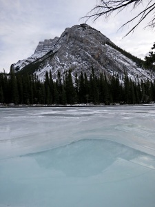 Mount Rundle reflected in green meltwater nice