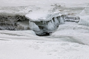 ... and zooming in on the icicle formations as the river level dropped.