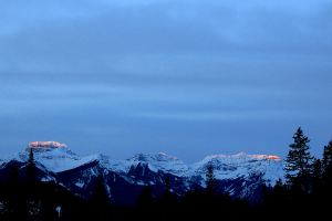 Fire gone from the cloud and now on the peaks of the Massive Range