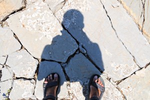 A shrunken me in the ridge-top threshing circle