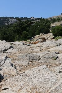 Looking across the rocky ridge-top to the Archangel Mihail Kokkimidis monastery