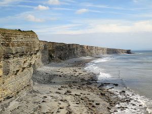 Looking back towards the Macross headland, all of the sand and much of the wave-cut platform now underwater.