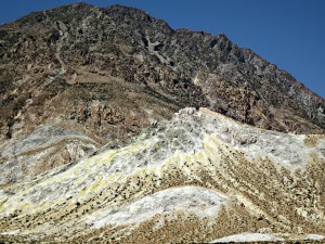 The cone of a small crater patterned by brilliant yellow sulphur.  The eye can adjust for the contrast, my technical skill as a photographer can’t.
