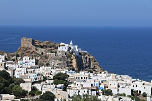 Looking down across Mandraki, the island’s main town, to the dilapidated Norman castle and the Pangia Spiliani monastery