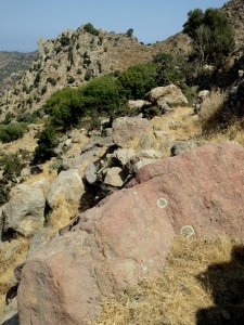 Clambering over small boulders across the path, the lava ‘neck’ of Parleta in the background