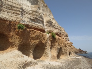 Continuing along the beach, shallow caves just above sea level