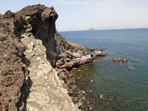 Finally reaching solid ground on the lava extrusion, a huge scallop shape opening out towards the sea